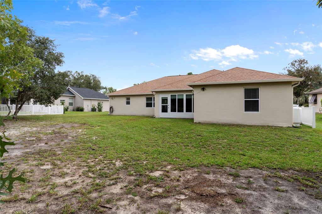 7 Bigleaf Court Homosassa, FL 34446 - Photo 55 of 71 a front view of a house with garden