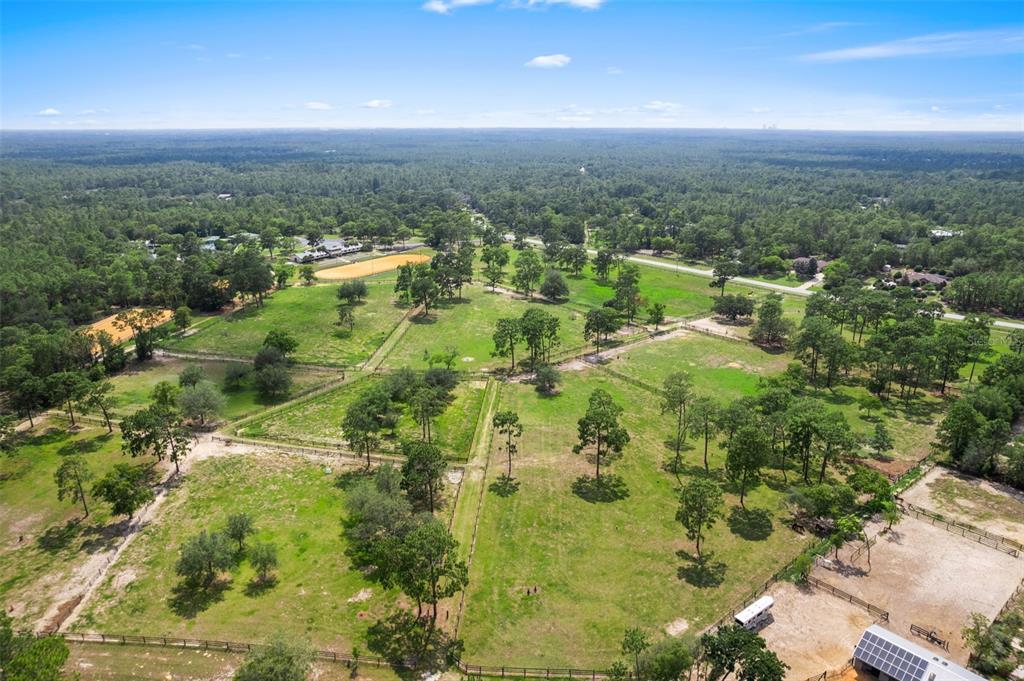 7 Bigleaf Court Homosassa, FL 34446 - Photo 70 of 71 an aerial view of residential houses with outdoor space and trees