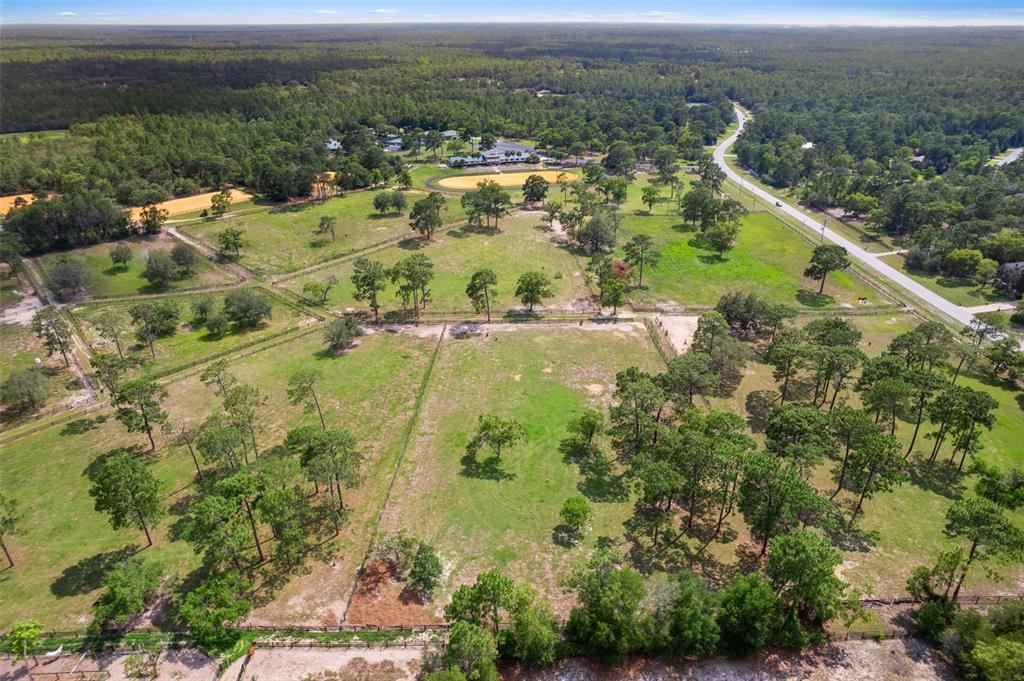 7 Bigleaf Court Homosassa, FL 34446 - Photo 71 of 71 an aerial view of residential houses with outdoor space and trees