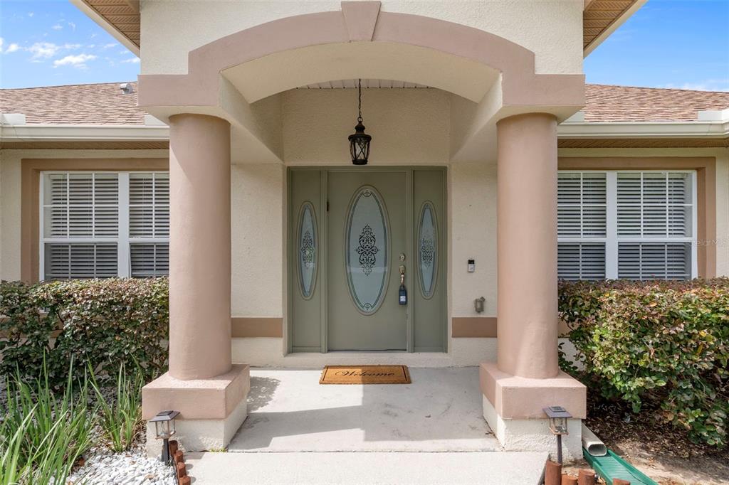 7 Bigleaf Court Homosassa, FL 34446 - Photo 8 of 71 a front view of a house