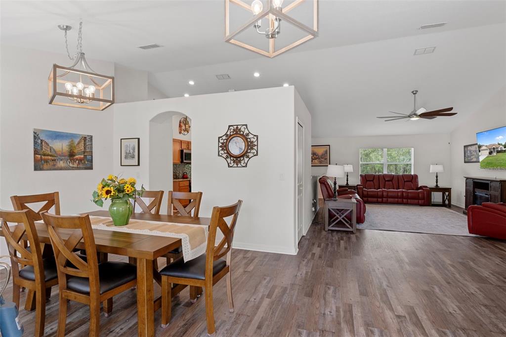 7 Bigleaf Court Homosassa, FL 34446 - Photo 9 of 71 a view of a dining room with furniture and wooden floor