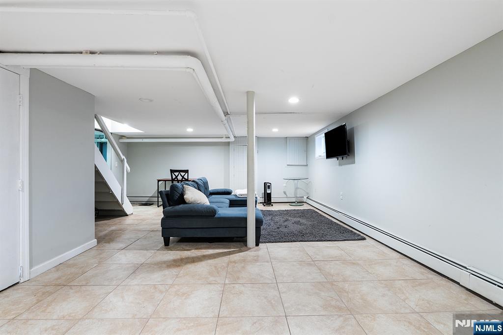 15 Victor Place Irvington, NJ 07111 - Photo 8 of 20 a living room with furniture