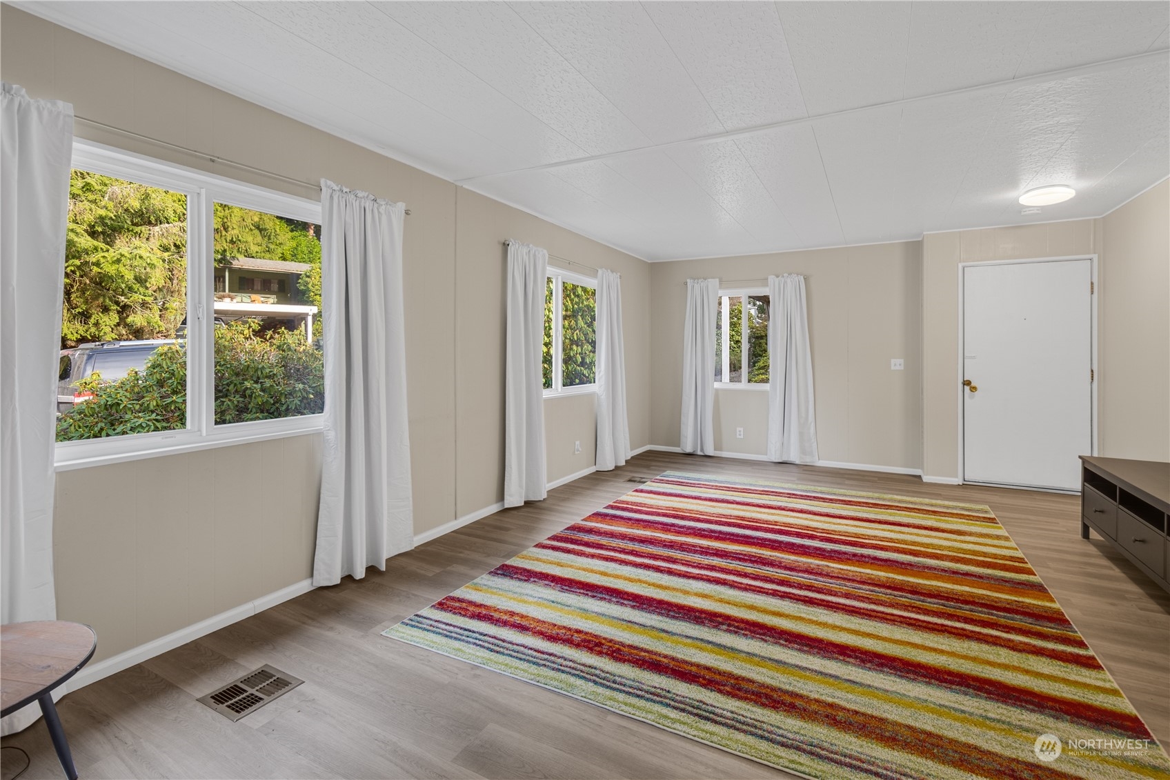 3312 206th Place Southeast Bothell, WA 98012 - Photo 4 of 25 a bedroom with a bed and a window