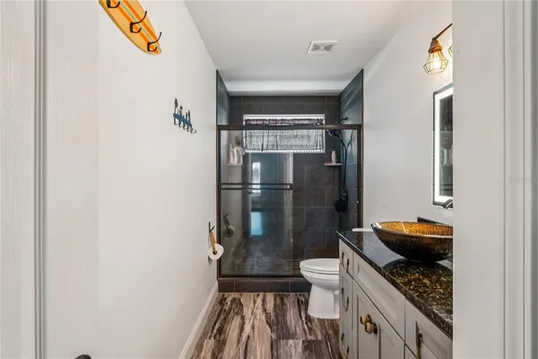 a utility room with sink dryer and washer