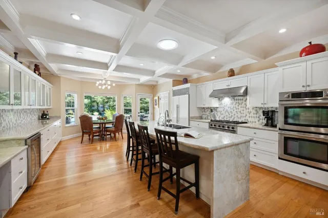 a outdoor dining space with furniture and garden view