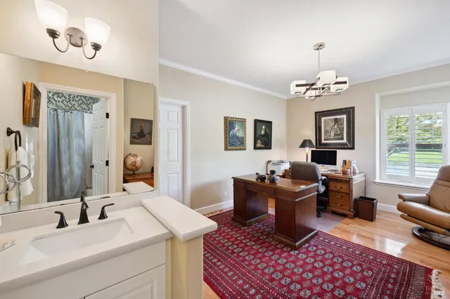 a white toilet sitting next to a shower curtain