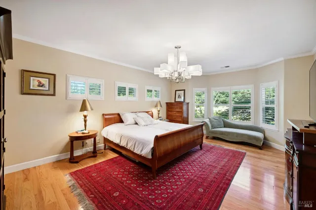 a bathroom with sink a vanity and a large mirror