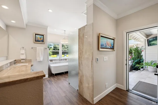 a view of a patio filled with furniture