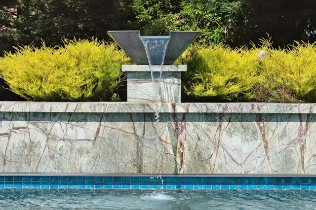 a view of a table and chairs in patio