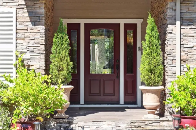 a view of living room with furniture and floor to ceiling window