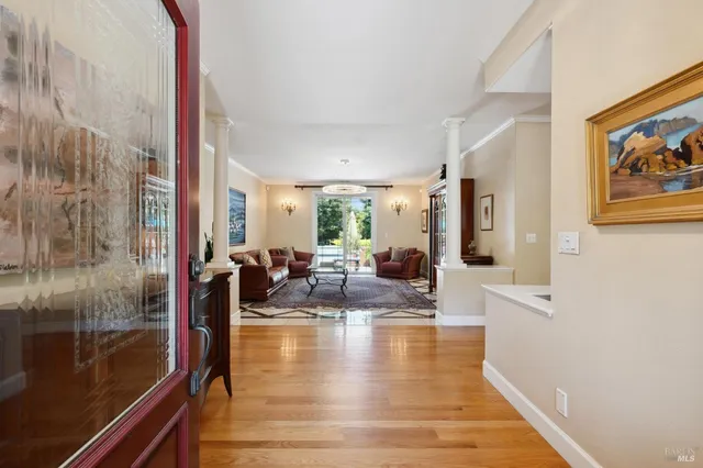 a view of a livingroom with furniture and window