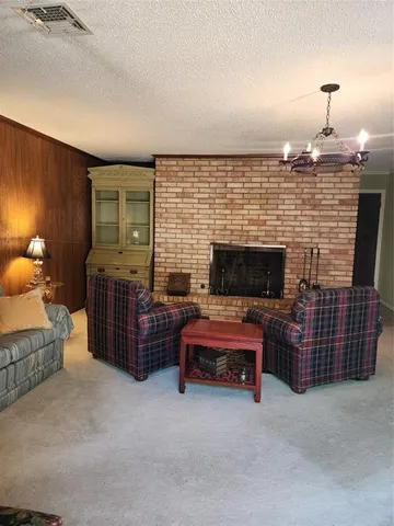 a bathroom with a sink a mirror and a shower