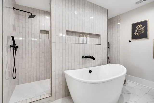 a bathroom with a double vanity sink and a mirror
