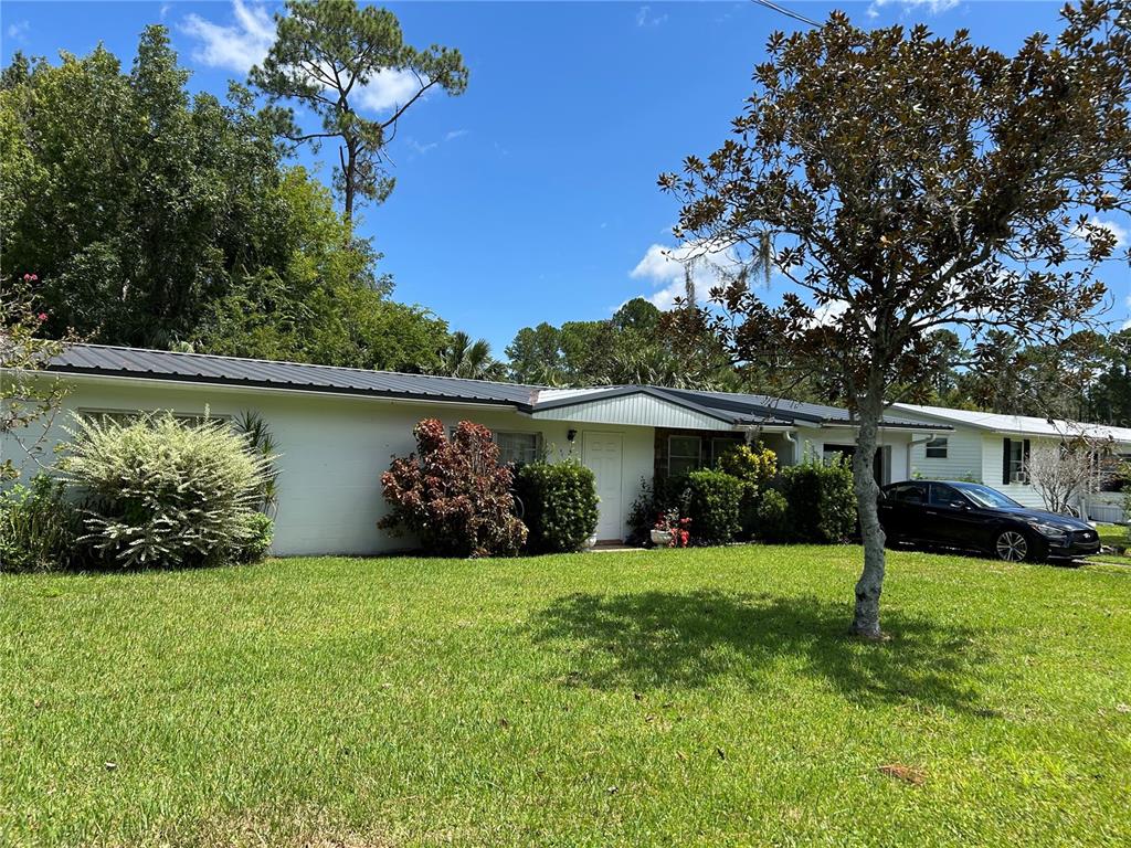 a view of a garden with a bench
