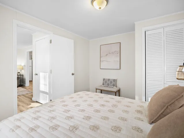 a bathroom with a sink a toilet and shower curtain