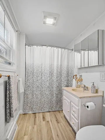 a utility room with sink dryer and washer