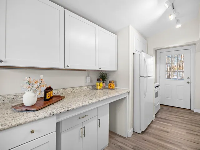 a view of a room with a wooden walls
