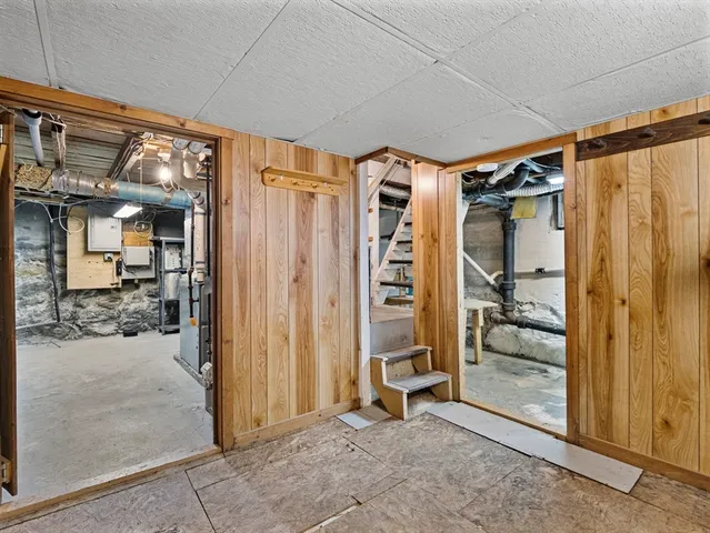 a view of a room with a wooden walls