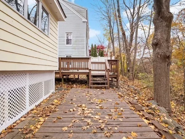 a view of a patio with a bench