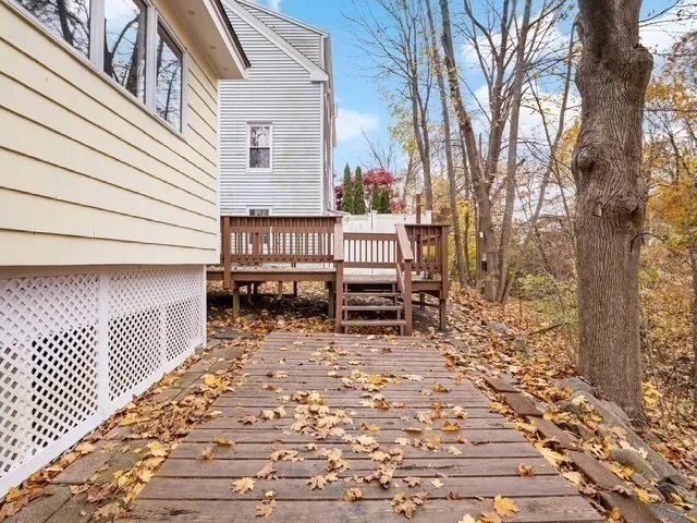 a view of a patio with a bench