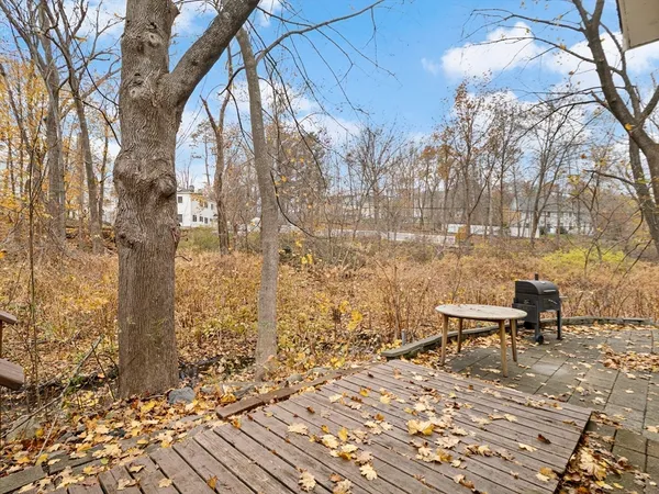 a view of a house with a small yard