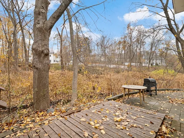 a view of a house with a small yard
