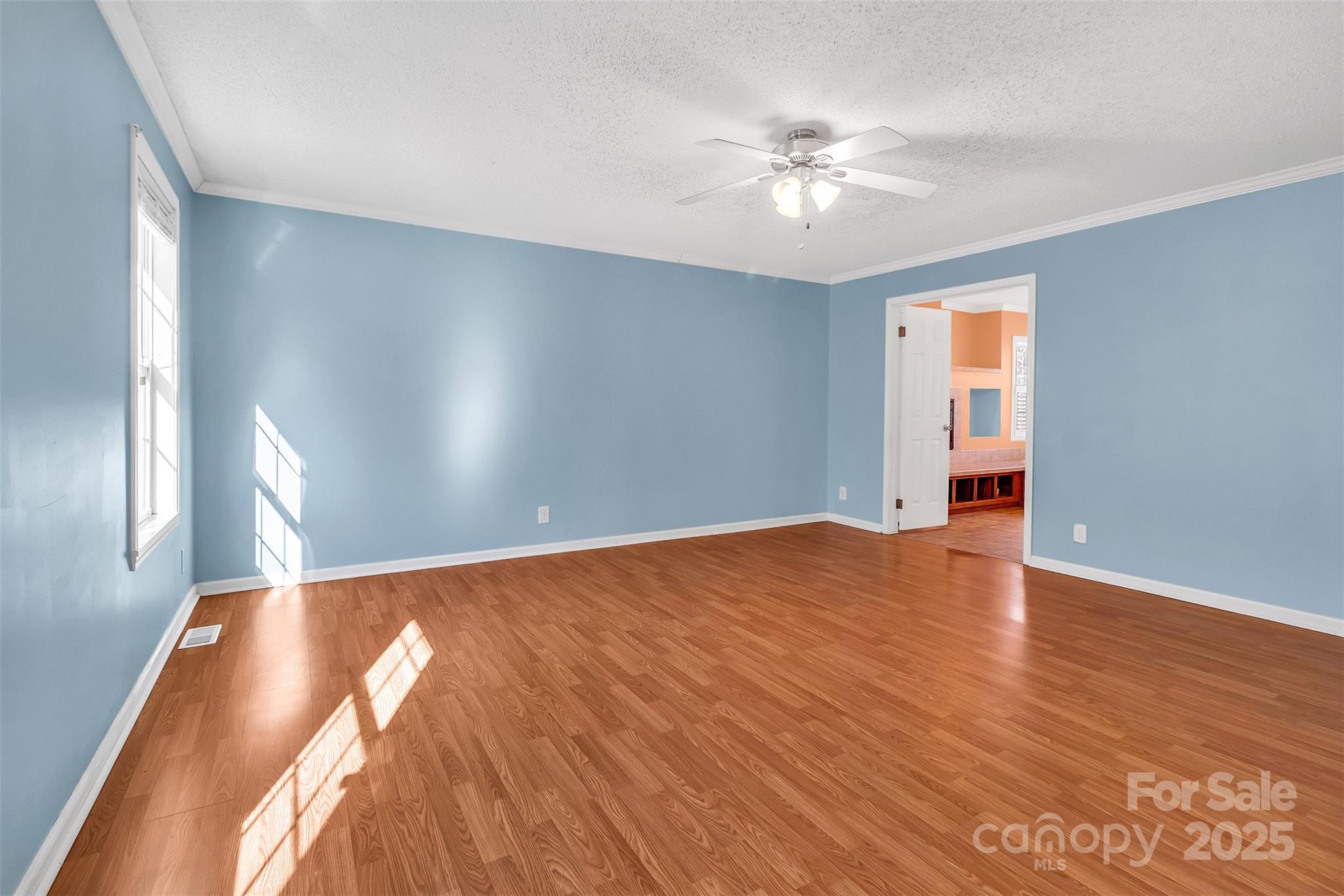 530 Ole Simpson Place Catawba, SC 29704 - Photo 13 of 36 a view of an empty room with wooden floor and a window