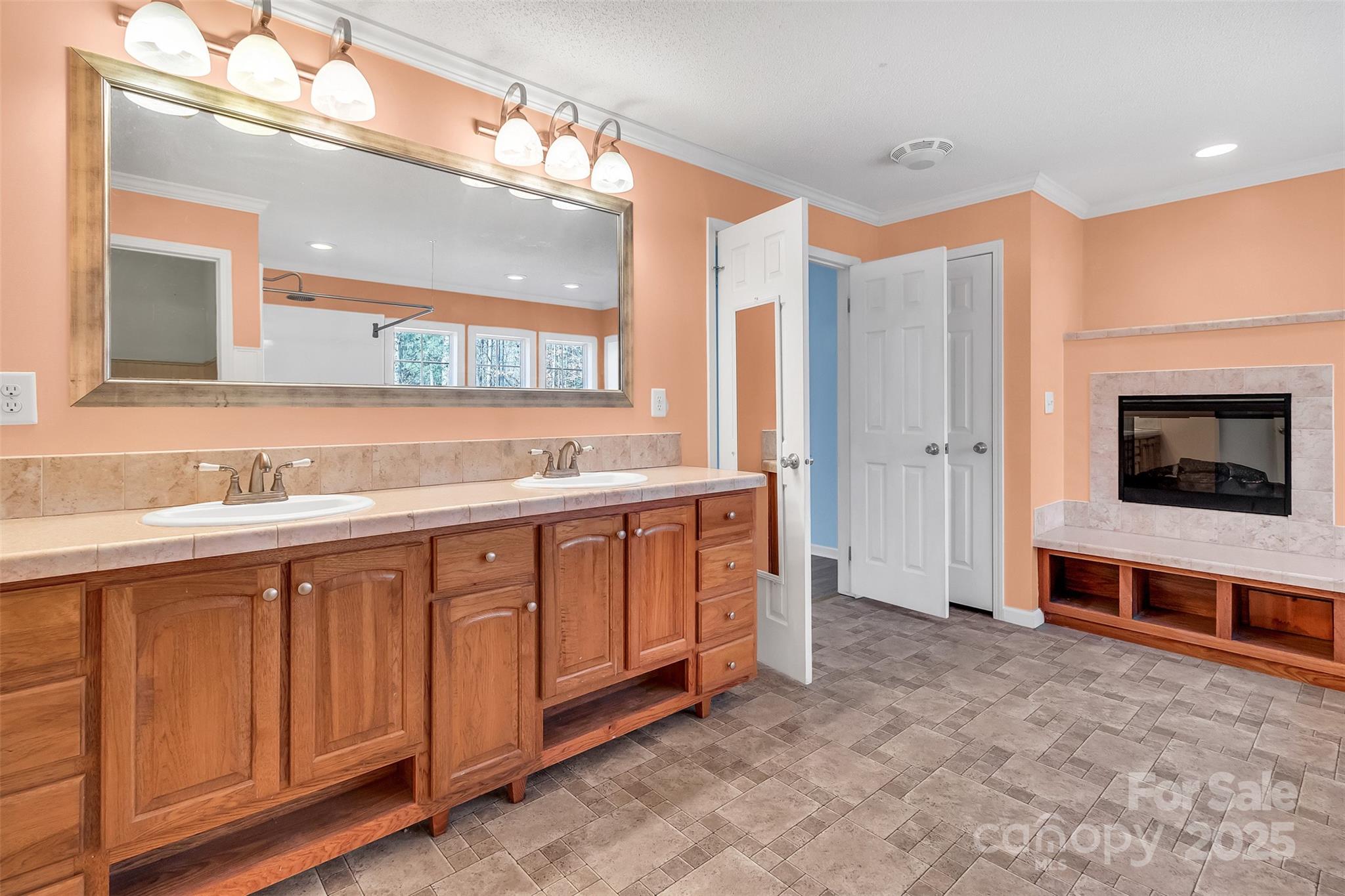 530 Ole Simpson Place Catawba, SC 29704 - Photo 17 of 36 a spacious bathroom with a double vanity sink and a mirror