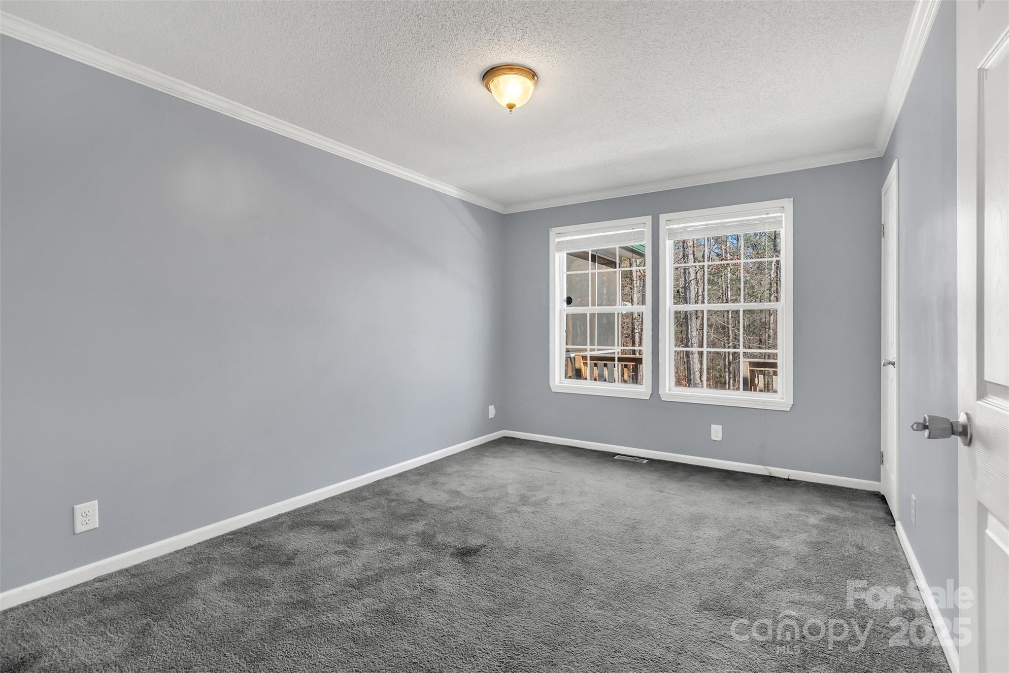 530 Ole Simpson Place Catawba, SC 29704 - Photo 21 of 36 an empty room with windows