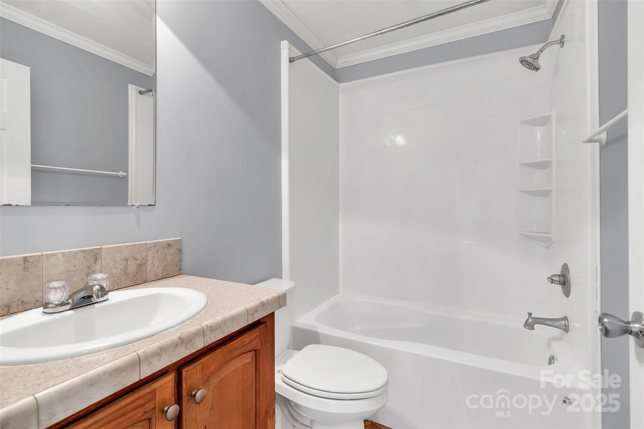 530 Ole Simpson Place Catawba, SC 29704 - Photo 23 of 36 a bathroom with a granite countertop sink toilet and shower