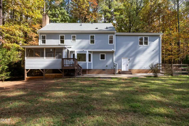 a picture of a bathroom with a shower