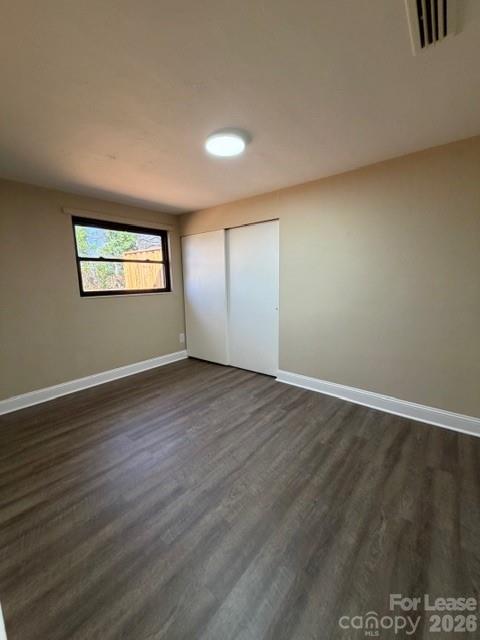 904 8th Avenue Southwest Conover, NC 28613 - Photo 6 of 8 a view of empty room with wooden floor and fan