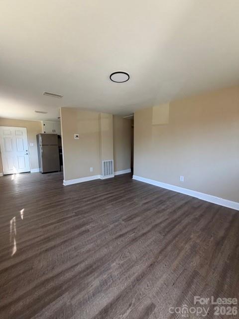904 8th Avenue Southwest Conover, NC 28613 - Photo 7 of 8 a view of a room with wooden floor and painting on the wall