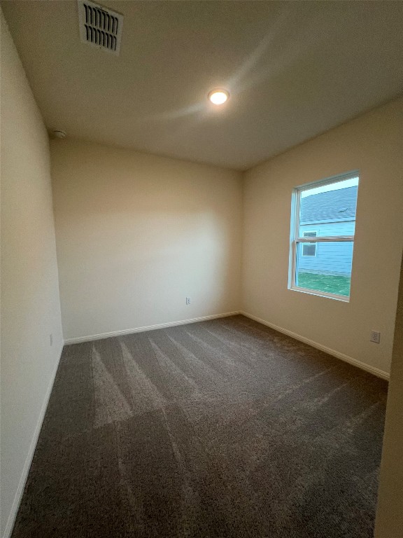 124 Rother Place Taylor, TX 76574 - Photo 16 of 24 a view of an empty room and a window