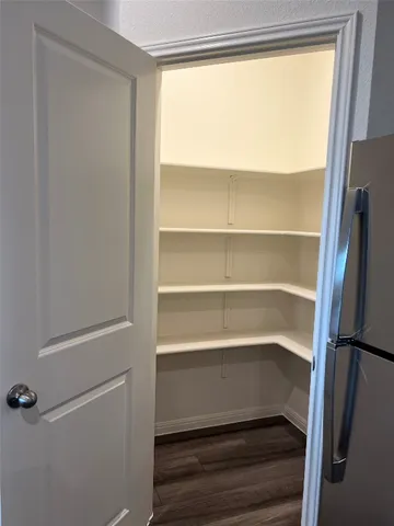 a view of a kitchen with a sink