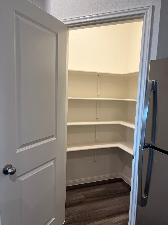 124 Rother Place Taylor, TX 76574 - Photo 7 of 24 a view of walk in closet with empty racks