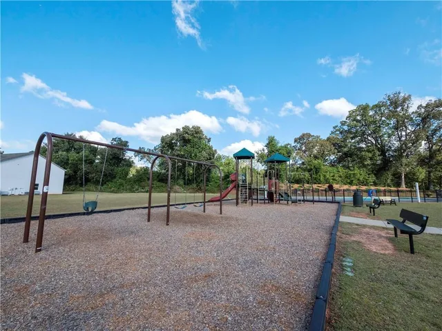 a view of a swimming pool with a porch