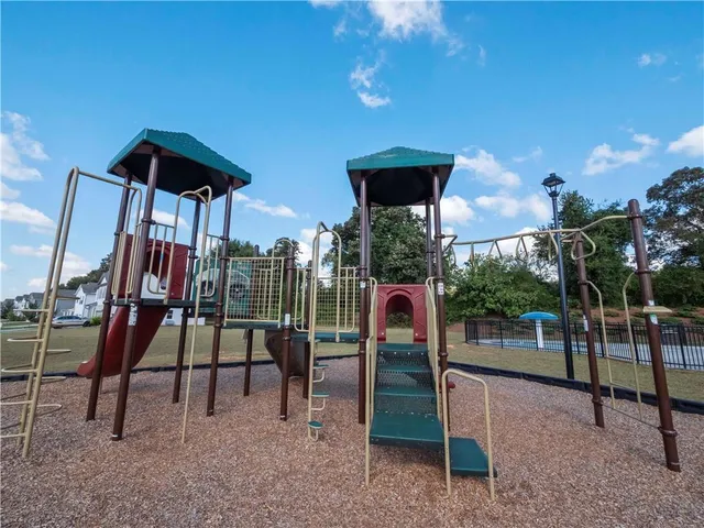 a view of a golf course with a lake