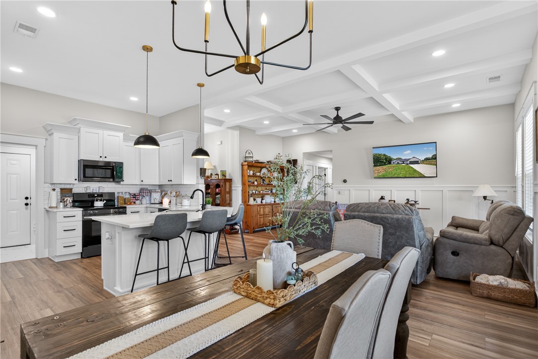 106 Bolt Road Townville, SC 29689 - Photo 11 of 33 An open concept design seamlessly connects the culinary space to the living area, perfect for daily routines.