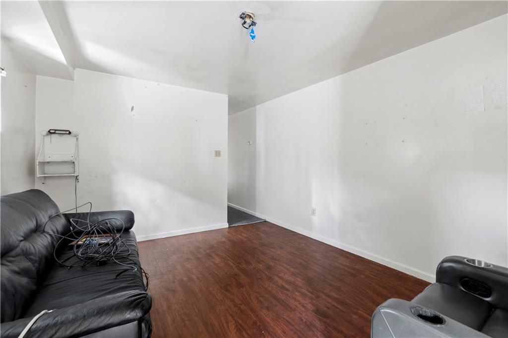 634 Broadway Avenue McKees Rocks, PA 15136 - Photo 19 of 40 a living room with furniture and a wooden floor