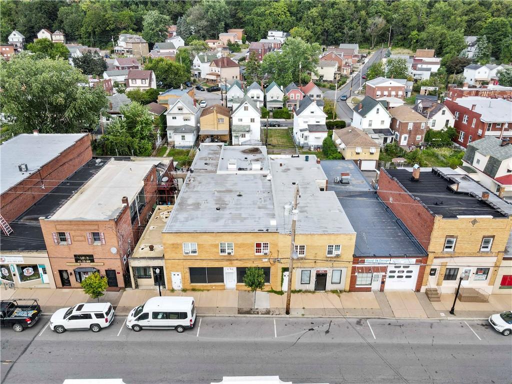 634 Broadway Avenue McKees Rocks, PA 15136 - Photo 2 of 40 an aerial view of a building with parked cars