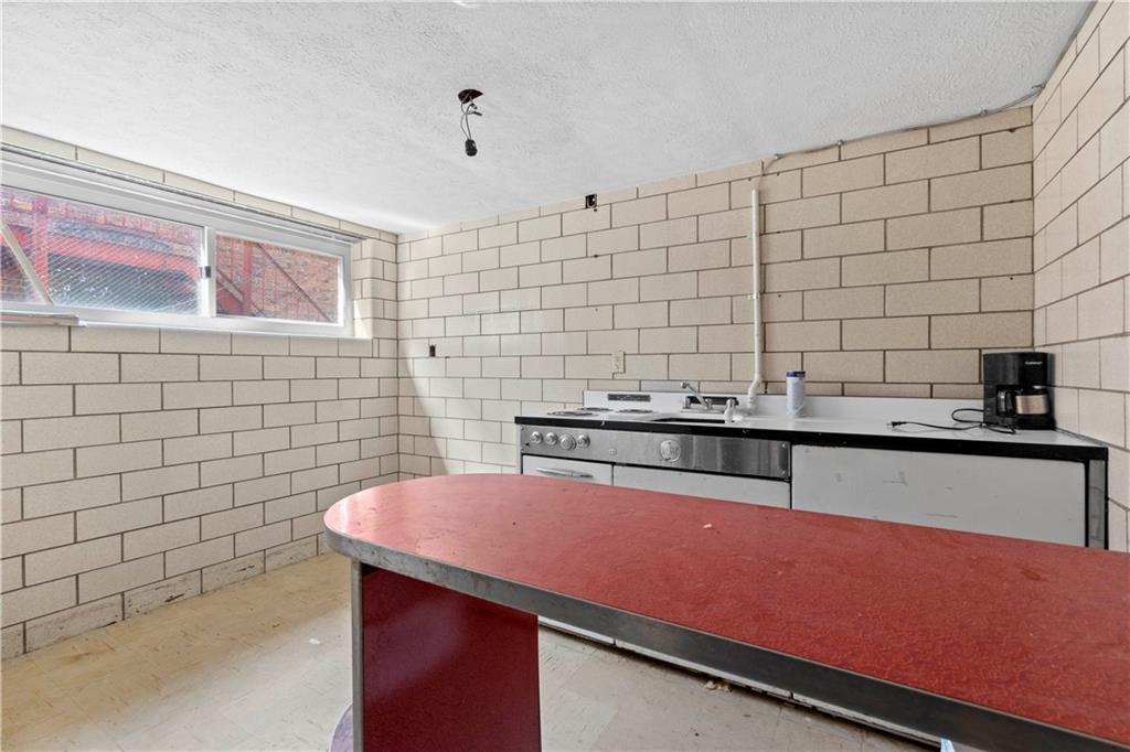 634 Broadway Avenue McKees Rocks, PA 15136 - Photo 22 of 40 a kitchen with a sink and cabinets