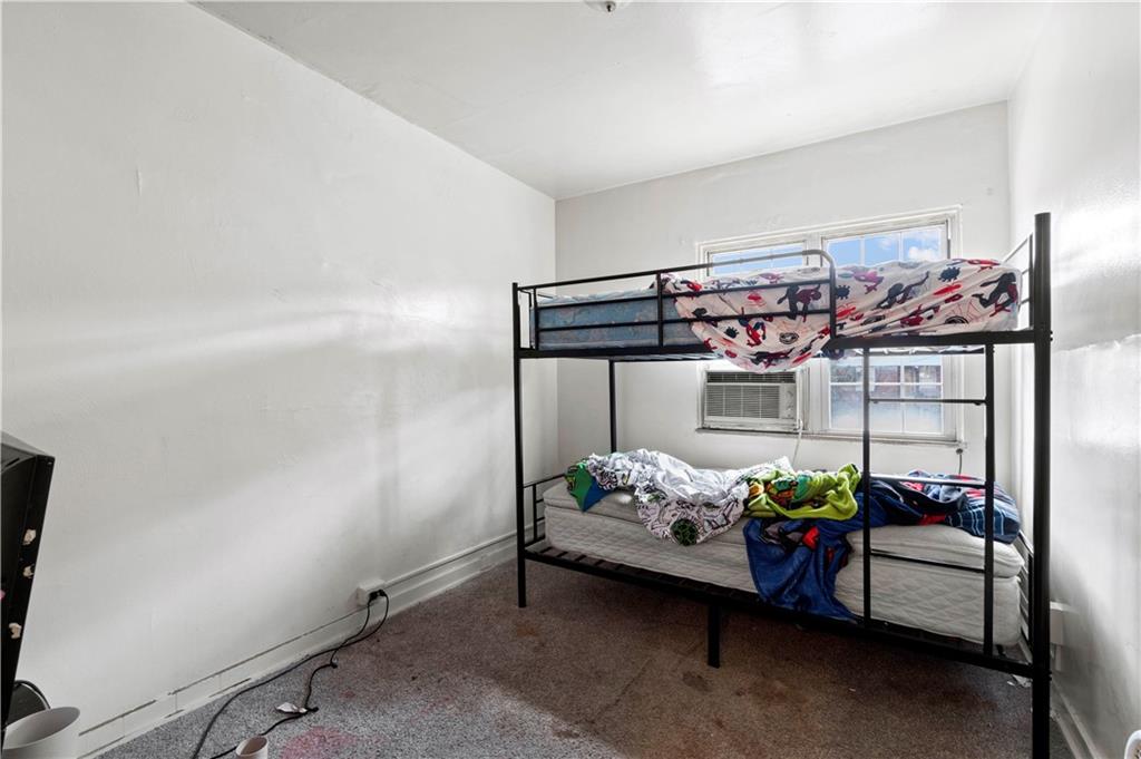 634 Broadway Avenue McKees Rocks, PA 15136 - Photo 36 of 40 a bedroom with furniture and a bed