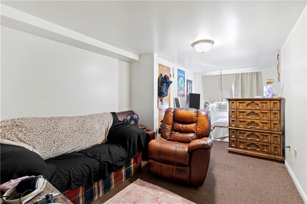 634 Broadway Avenue McKees Rocks, PA 15136 - Photo 39 of 40 a living room with furniture and a couch