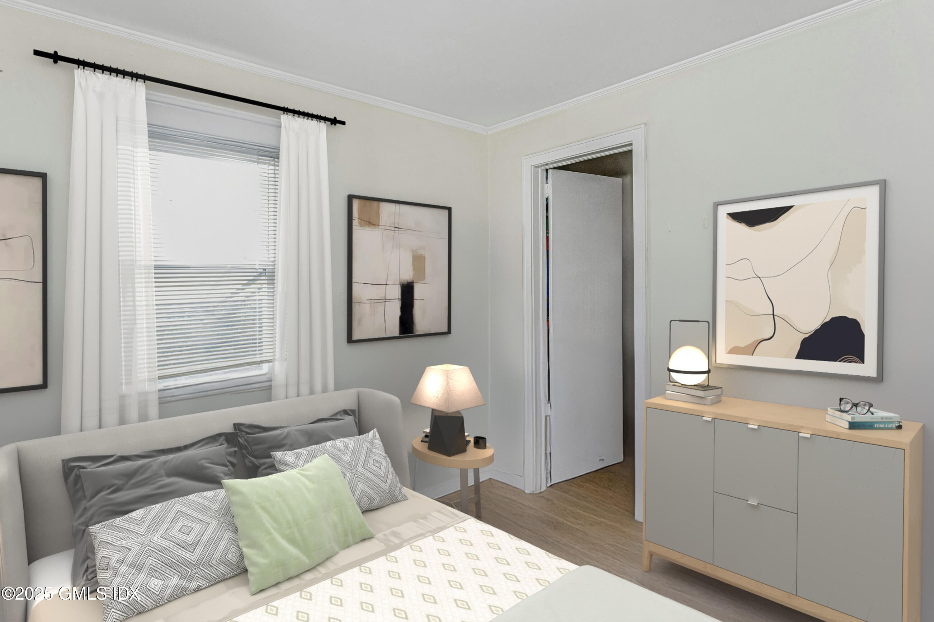 38 Alexander Street Greenwich, CT 06830 - Photo 16 of 36 a bedroom with a bed and a window