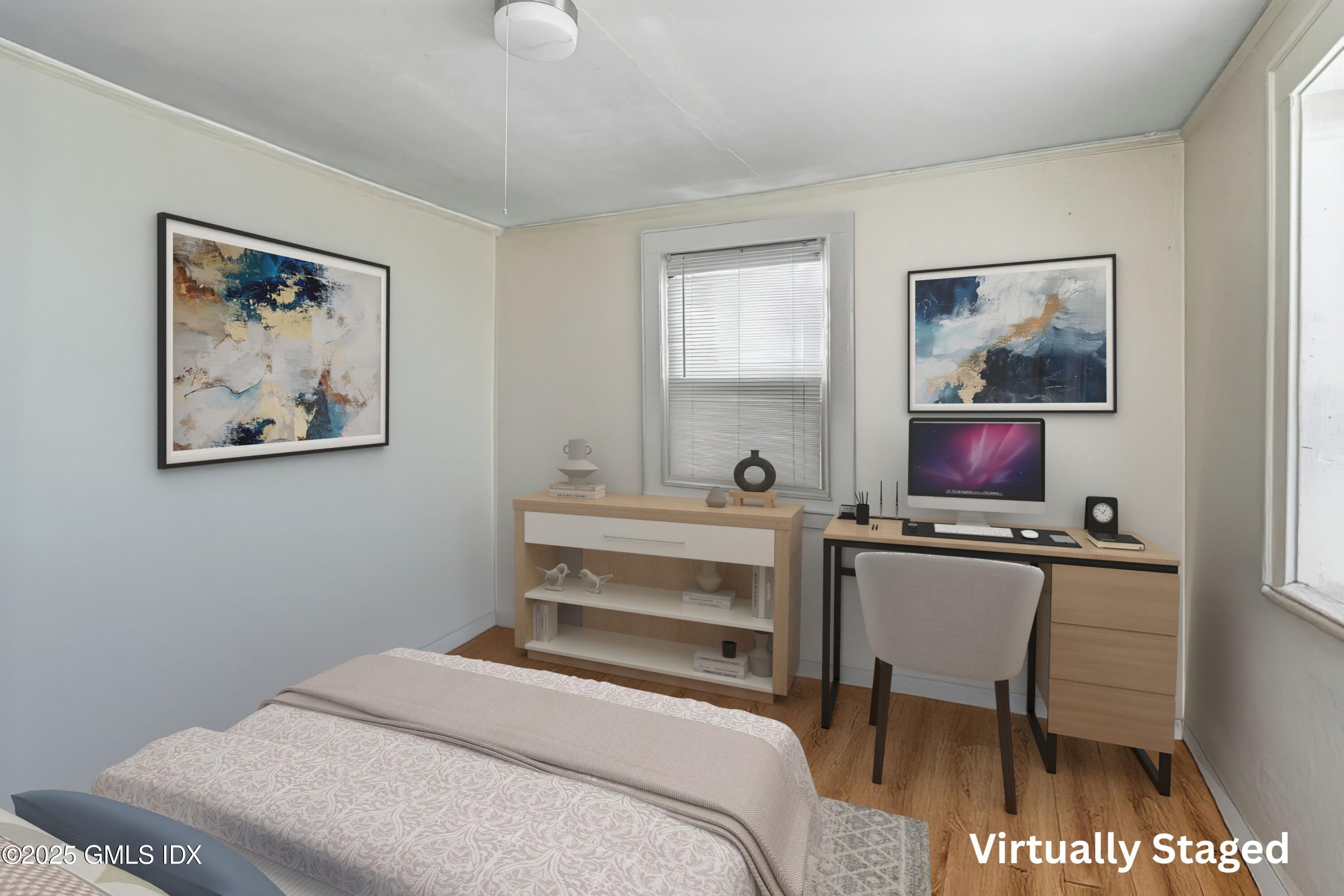 38 Alexander Street Greenwich, CT 06830 - Photo 18 of 36 a bedroom with a bed and a desk