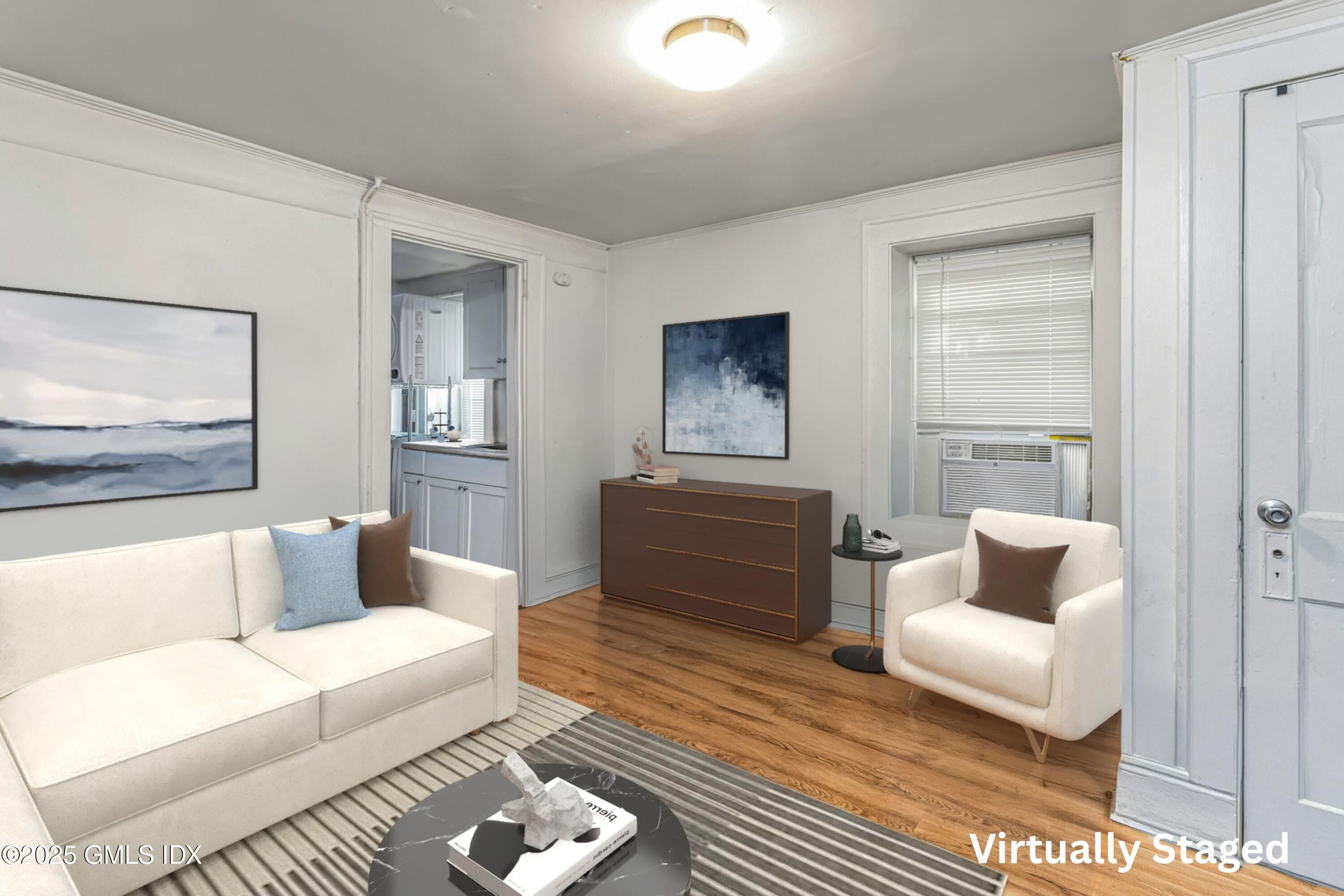 38 Alexander Street Greenwich, CT 06830 - Photo 6 of 36 a living room with furniture and a couch