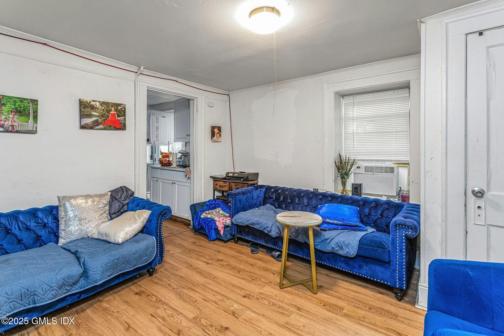 38 Alexander Street Greenwich, CT 06830 - Photo 7 of 36 a living room with furniture and a couch