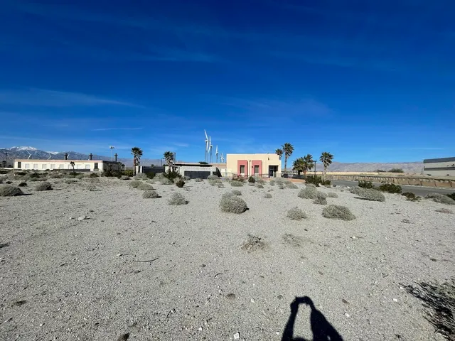 a view of ocean with a beach
