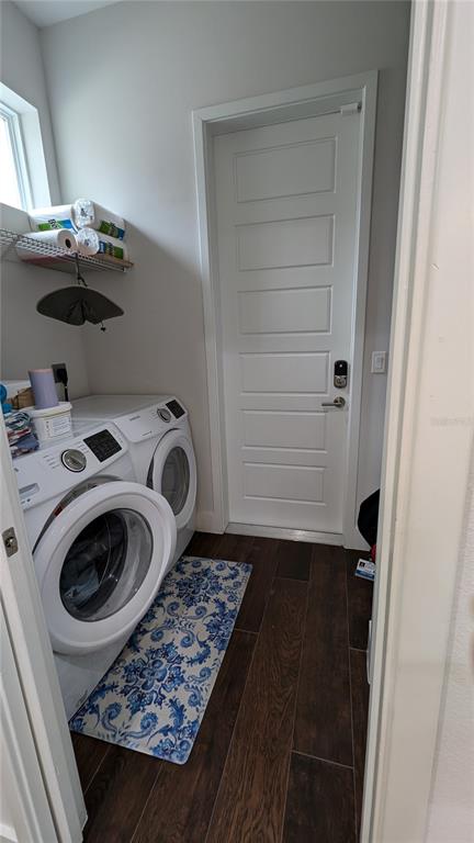 7476 Southwest 66th Lane Gainesville, FL 32608 - Photo 17 of 21 a utility room with dryer and washer